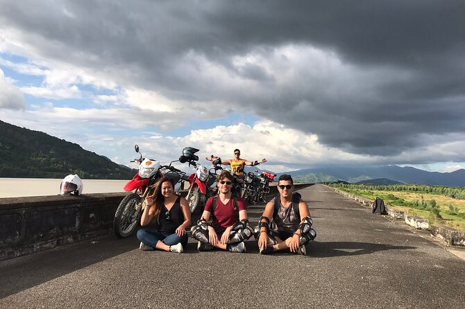 Ba Ho Waterfall and Countryside Guided Motorcycle Tour - Crossing the Cai River by wooden bridge
