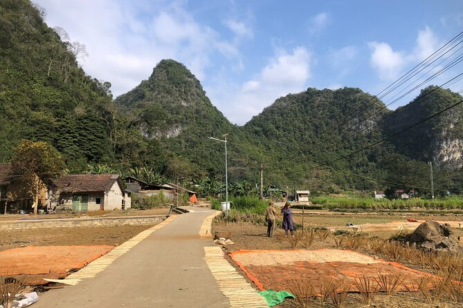 Ban Gioc Waterfall & Mt Angel Eye Full Day Trip with Easy Rider - Ban Gioc Waterfall and the border-country views