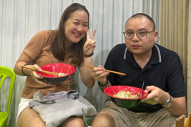 Da Nang Local Food Tour by Motorbike + Sightseeing SAFE & FUN - Helio Center and the city after dark