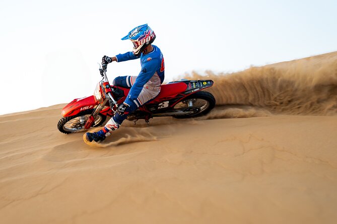 Desert Motorbike Tour in Dubai - Riding across steep dunes and open desert