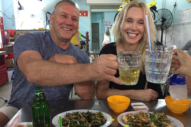 Experience Saigon Cuisine: Food Tour by Motorbike or Car - Riding through five districts on the back of a scooter