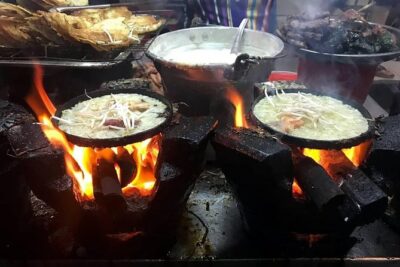 Experience Saigon Cuisine: Food Tour by Motorbike or Car