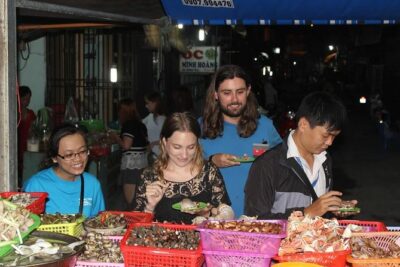 Food Tour by motorbike with local students