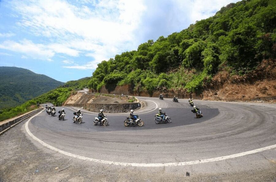From Hoi An: Explore Hai Van Pass with Motorbike Rider Tour - My Khe Beach and the Marble Mountains