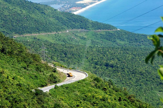 Full-Day Private Motorbike Tour in Hai Van Pass with Lunch - Marble Mountains adds steps, caves, and a final walk