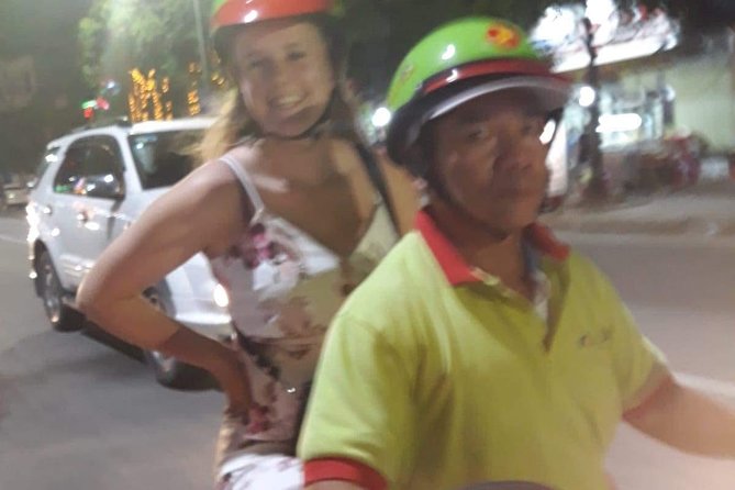 Half-Day Guided Hue Foodie Motorbike Tour - Daily life near the Citadel