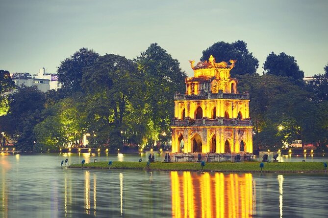 Hanoi City Motorbike Tour with Banana Island and Local Food - The Opera House sets the city’s formal tone