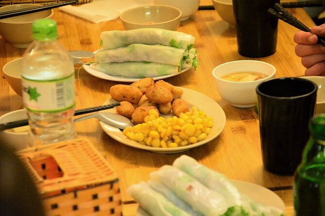 Hanoi Motorbike Tour Led By Women - City And Countryside Full Day - Hanoi Flag Tower and the railway through the city