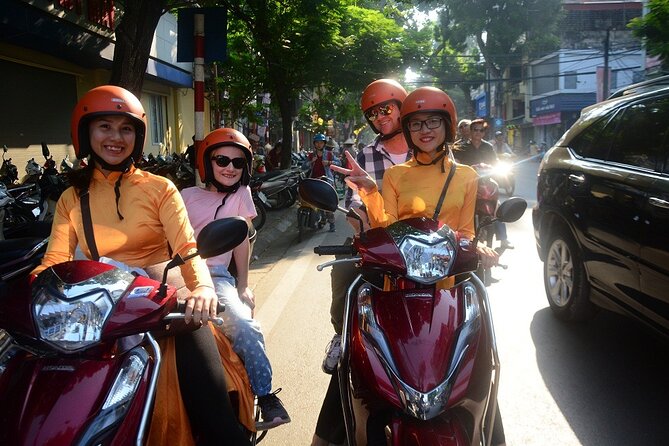 Hanoi Motorbike Tour Led By Women: Hanoi Motorbike Food Tours - Nightly rites near the Ho Chi Minh monument