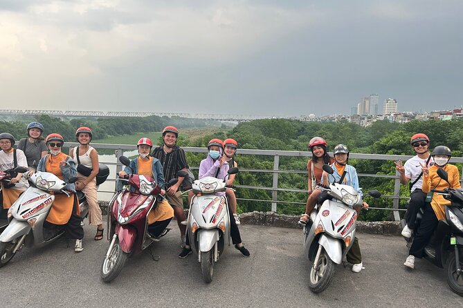 Hanoi Motorbike Tours: Hanoi Motorbike Food Tours Led By Women - Crossing Long Bien Bridge above the Red River