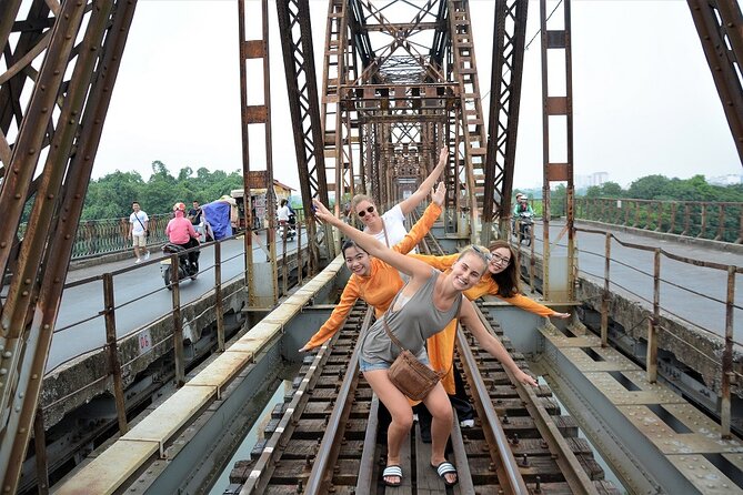 Hanoi Motorbike Tours Led By Women: Hanoi City Insight Motorbike Tours - Huu Tiep Lake and the downed B-52