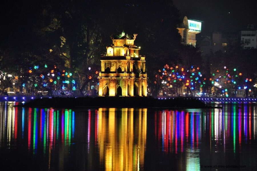 Hanoi Night Lights Food Tour by Motorbike - Riding beyond the tourist center