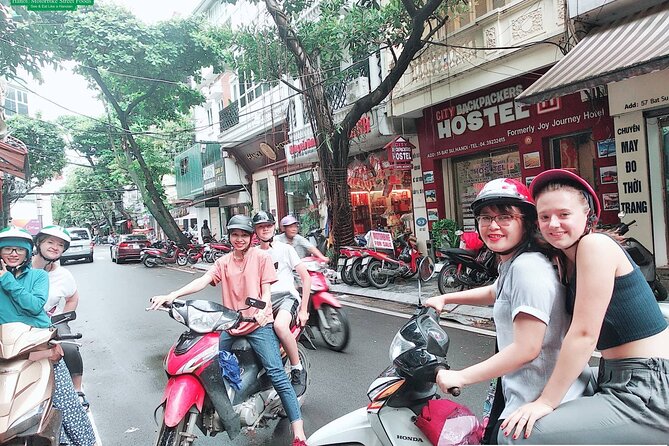 Hanoi Nightlife Food Tour By Motorbikes - Long Bien Bridge and Hanoi landmarks