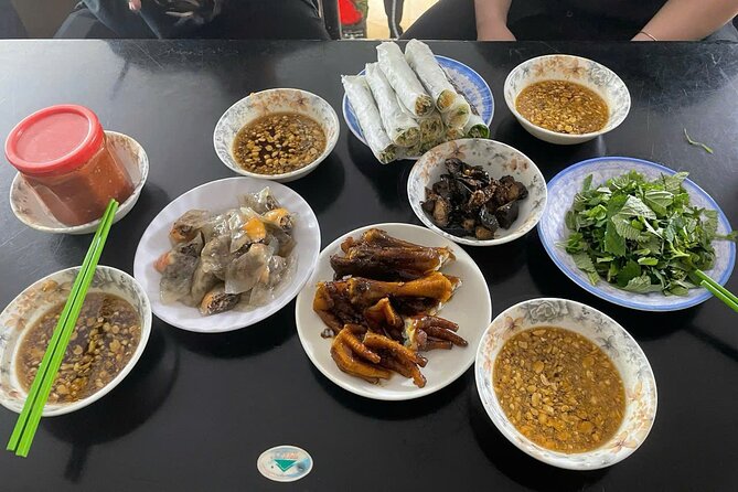 Hanoi Street Food Tour by Motorbike or Walking with Local Guide - Dong Xuan Market gives the tour its local pulse