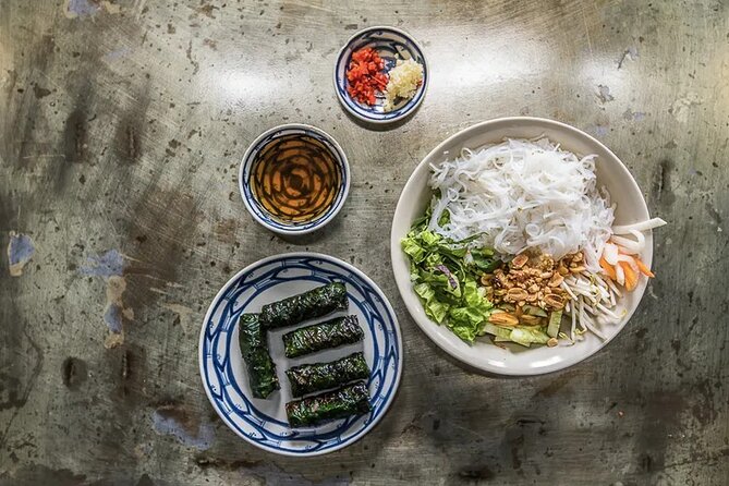 Hanoi Street Food Tour By Motorbike + Sightseeing SAFE & FUN - Snails, seafood, and the ride to West Lake