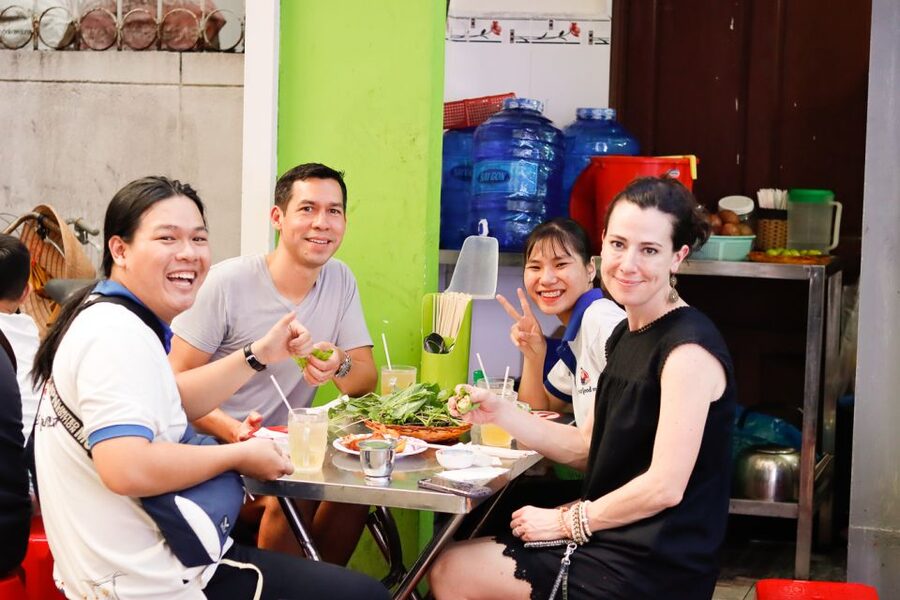 Ho Chi Minh City: Private Street Food Motorbike Tour - District 5 coconut ice cream and the fashion streets