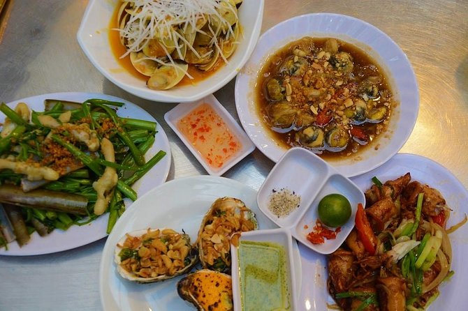 Ho Chi Minh Nightlife & Street Food Tour By Motorbike - Hồ Thị Kỷ Flower Market after dark