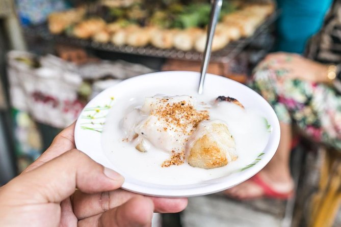 Ho Chi Minh Street Food Tour By Motorbike (Unique & Authentic) - Ba Son Bridge and the District 1 skyline