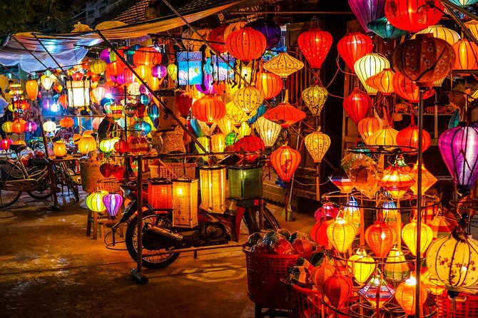 Hoi An Night Food Tour Motorbike & Lantern Cruise by Lady Rider - The old town after dark