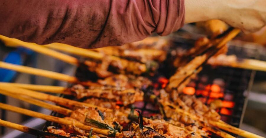 Hoi An Street Food Tour by Motorbike - Cao lau beside the Thu Bon River