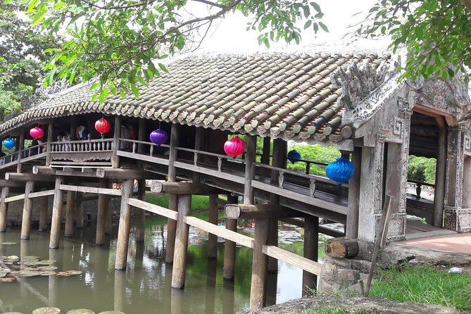 Hue Motorcycle Tour with Fishing: Best Unique Day Trips in Hue - Thanh Toan Bridge and village architecture