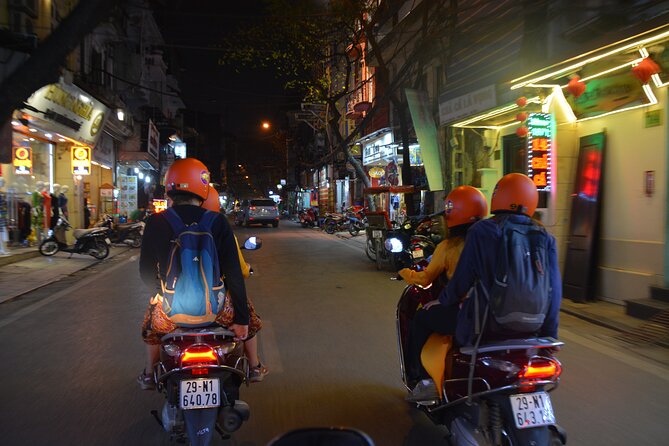 Led By Women - Hanoi Foodie Motorbike Tours - Walking along Duong Tau