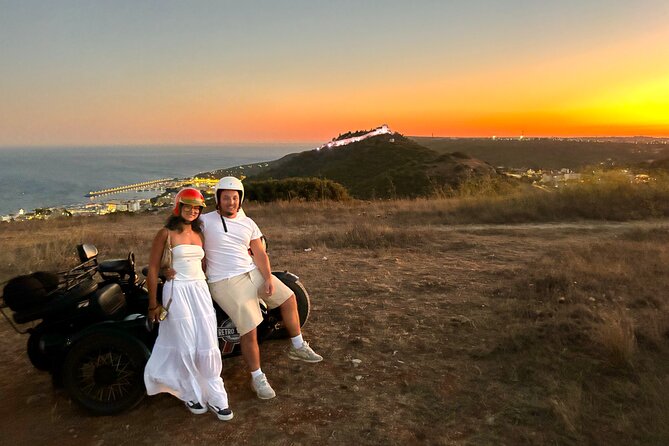 Lisbon - Private Vintage Sidecar Tour to Sesimbra's Coast - The beach, rocks, and open coastal roads
