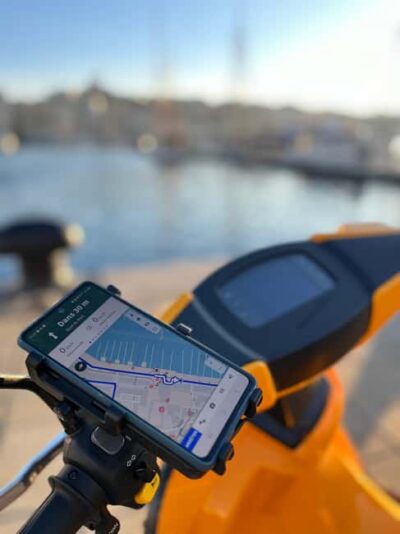 Electric Motorcycle Rental with Smartphone Guide