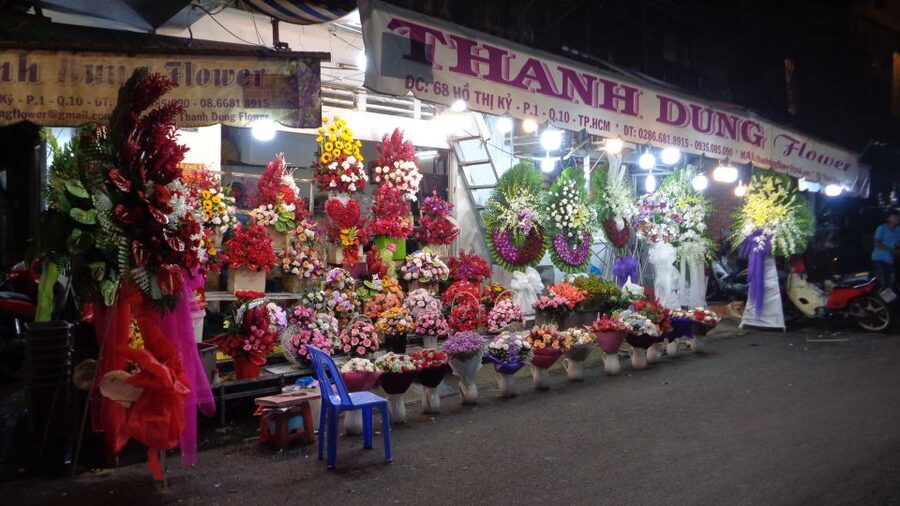 Midnight Street Food Tour In Saigon By Motorbike - Flowers arriving after midnight