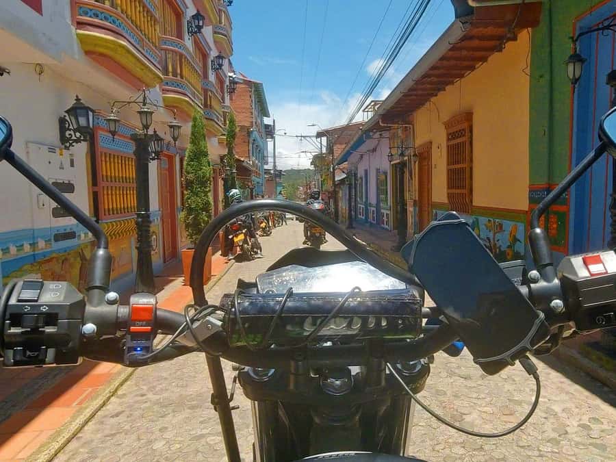 Motorcycle tour from Medellin to Guatape - Walking through Guatapé’s colorful streets