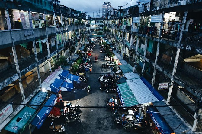 Private Hidden-Gem Sightseeing Motorbike Tour with Local Students - Old apartments and the shape of local life
