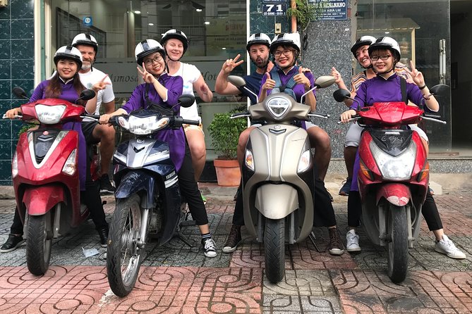 Private Ho Chi Minh Street Food Tour by Motorbike with Ao Dai Female Rider - Meeting your ao dai-clad guide