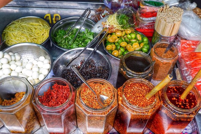 Private Saigon Street Food Tour with Motorbike - Stop four: snails and a local seafood buffet