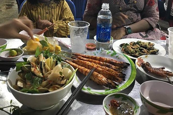 Private Saigon Street Food Tour with Motorbike - Stop one: rice paper salad and tropical drinks