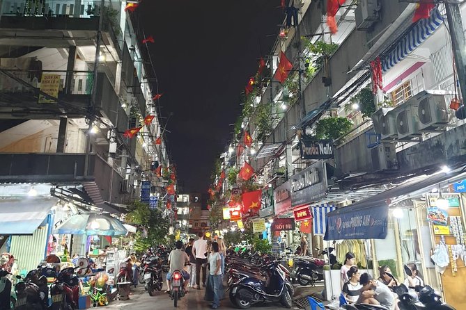 Private sight-seeing motorbike tour with local expert/student in HCMC - Coffee, street food, and the small extras