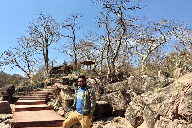 Raneh waterfall Khajuraho (motorcycle tour) - Passing farms, buffalo, and village temples