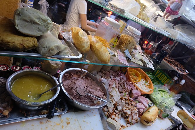 Saigon After Dark and Street Food by Motorbike and Scooter - The flower market and a ride through District 5