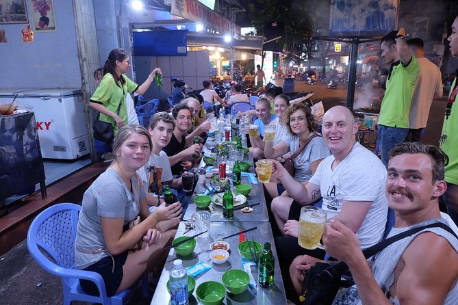 Saigon After Dark and Street Food by Motorbike and Scooter - District 4 and the seafood finale