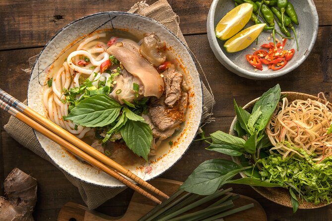 Saigon By Night and Vietnam Local Food on Motorbike - Bun bo Hue brings central Vietnam to Saigon
