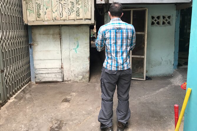 Saigon Slum tour and Saigon Chillspots by motorbike/ Aodai rider - A charity food stop and everyday local flavors