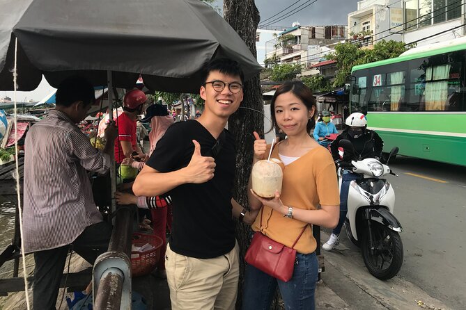 Saigon Slum tour and Saigon Chillspots by motorbike/ Aodai rider - The flower market and the lotus connection