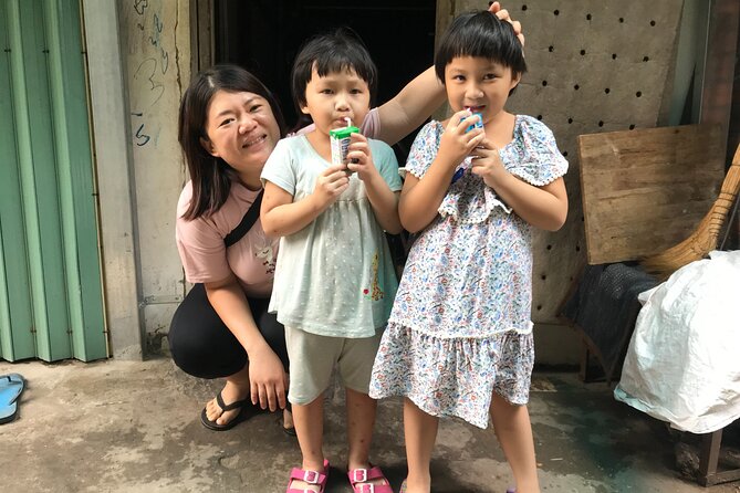 Saigon Slum tour and Saigon Chillspots by motorbike/ Aodai rider - What $16 really buys you