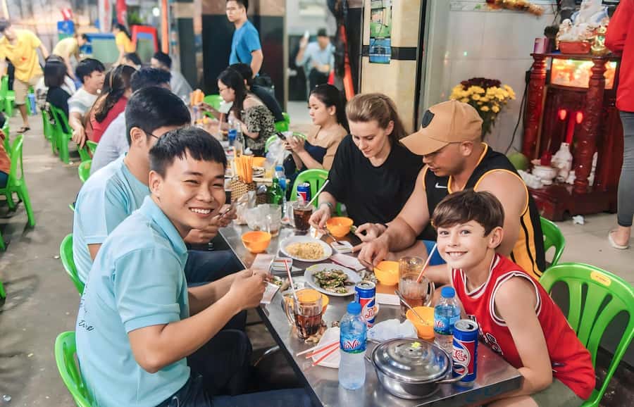 Saigon: Street Food Tasting & Sightseeing Tour by Motorbike - Banh mi, flan, tea, and beer