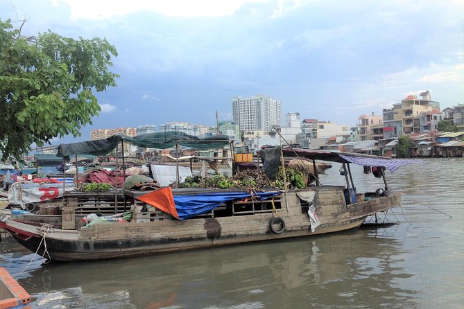 Saigon Unseen and Food Tour by Motorbike - Ho Thi Ky Flower Market by motorbike
