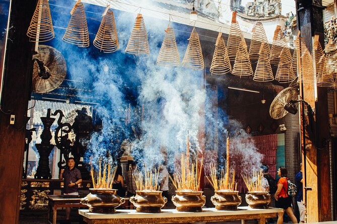 Saigon Unseen, History, & Hidden Gems Sightseeing Motorbike Tour - Chinatown and the ancient temple in District 5