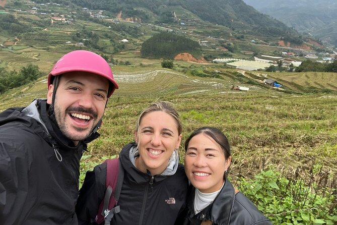 Sapa Loop Full Day Motorbike Tour with Lunch - Ta Phin combines a monastery, cave, and terraces