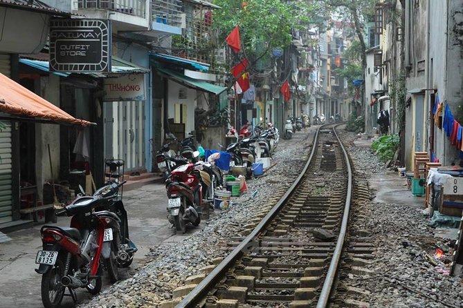 Small-group motorbike sightseeing and food tour in Hanoi - Huu Tiep Lake and the downed B-52