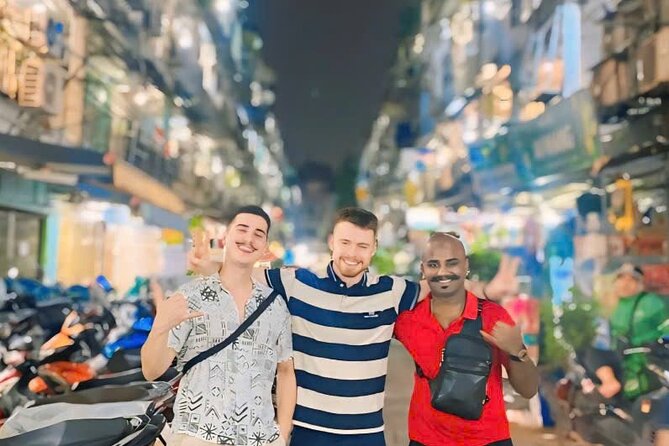Street Food Tour In Ho Chi Minh City By Motorbike - Crossing the city at Ba Son Bridge