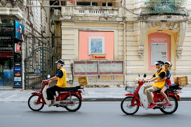 Vintage Motorbike Tour | Historic City Tour with Lunch Included - The Opera House and two versions of central Hanoi